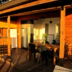 aito bungalow exterior view of the bungalow with kitchen, dining area and large terrace