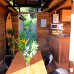 anuhe bungalow fully equipped kitchen and dining area on the terrace
