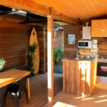 anuhe bungalow fully equipped kitchen with dining area on the terrace