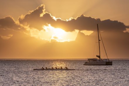 sunset with tahitian outrigger