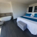 Villa Bounty bathtub and king size bed of the master suite