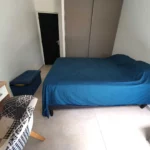 Villa Bounty bedroom with queen size bed and storage