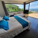 villa bounty king size bed of the master suite with ocen view